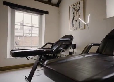 Modern treatment room at Abigail Louise Aesthetics in Chester, England, GB with large window view.