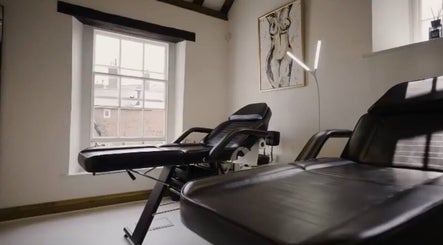 Modern treatment room at Abigail Louise Aesthetics in Chester, England, GB with large window view.