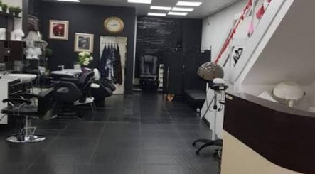 Interior of Main d’Or by Grace, a chic beauty salon in West Drayton, England, GB, showcasing stylish decor and salon chairs.