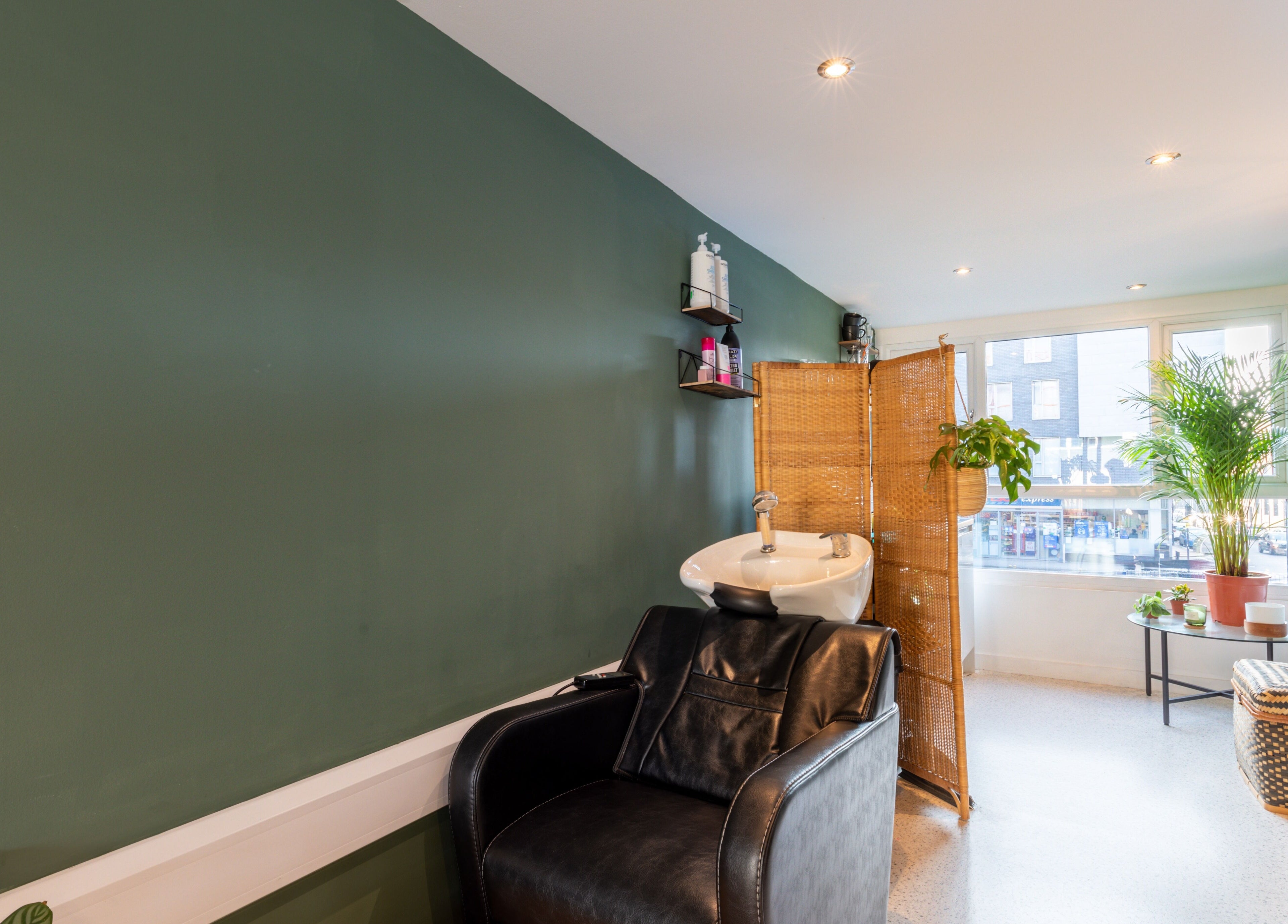 Tranquil wash station at Re:Create Hair Studio, London, England, GB, with chic decor and natural light.