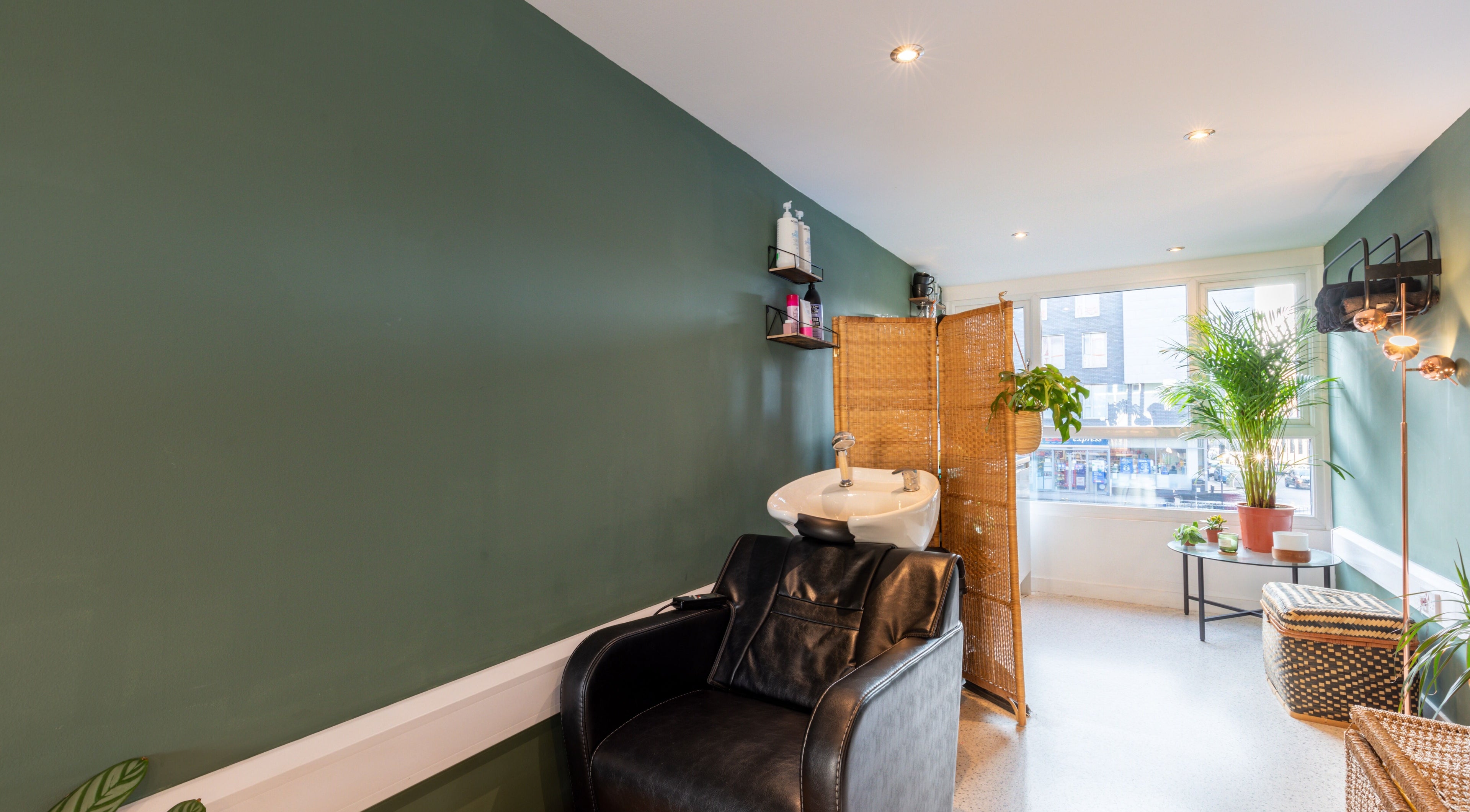 Tranquil wash station at Re:Create Hair Studio, London, England, GB, with chic decor and natural light.