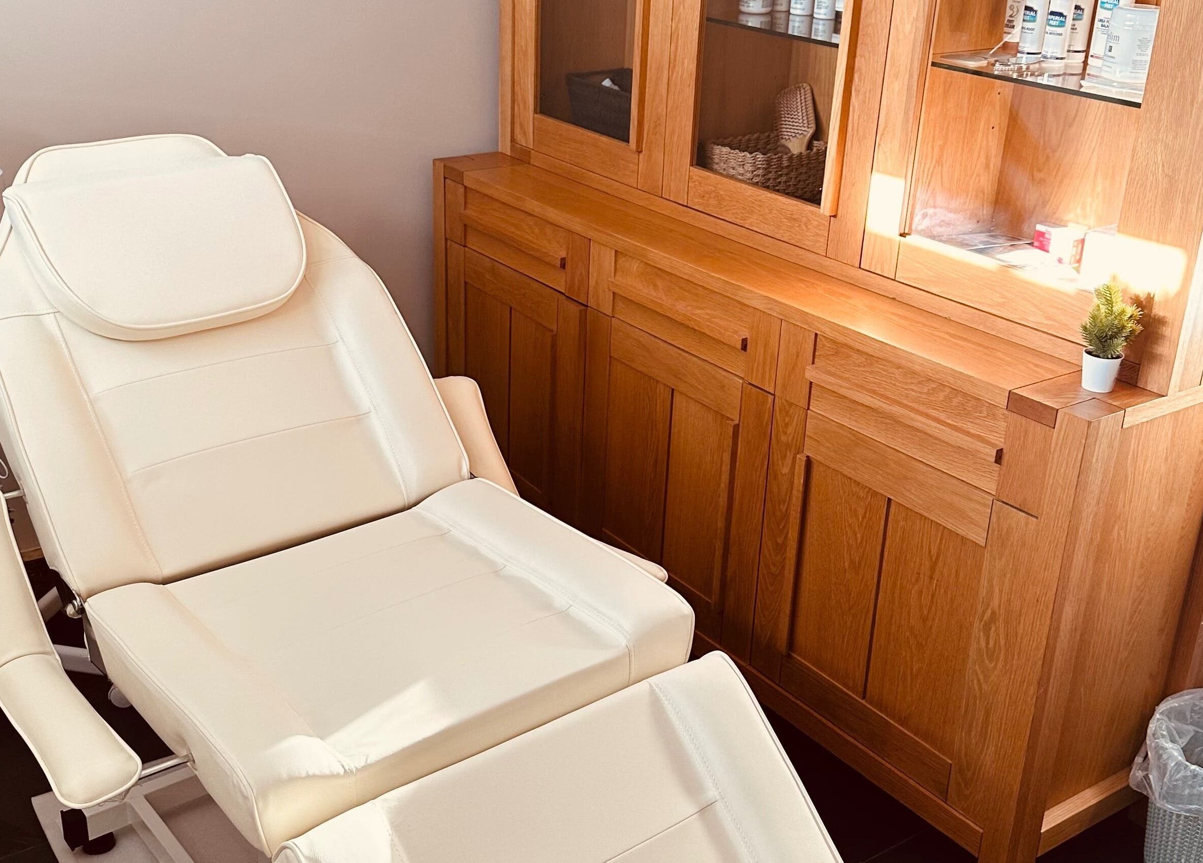 Elegant beauty room at Aylesbury health and wellness ltd in Aylesbury, England, GB with a plush treatment chair.