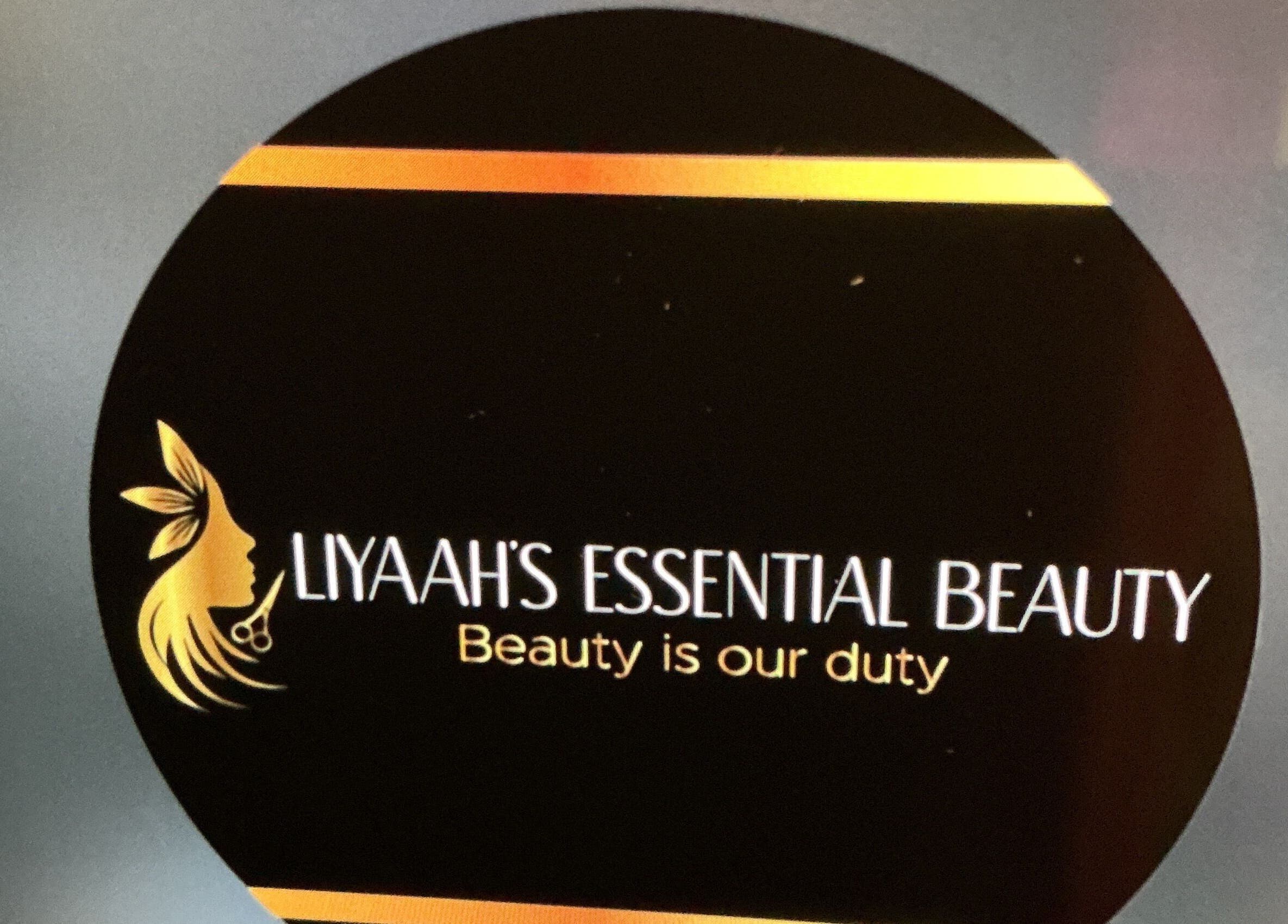 Liyaah’s Essential Beauty logo featuring a golden silhouette in Waterford, St. Catherine Parish, JM.