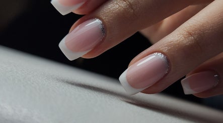 Elegant French manicure with silver accents at Nail By Atefe, Budapest, Magyar, HU.