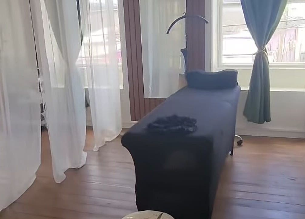 Elegant treatment room at Shen Lash Bar, Bridgetown, Saint Michael, BB, with soft lighting and cozy bed.