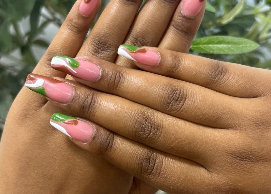 Stylish pink and green nail art at Lyn's beauty studio, Sandton, Gauteng, ZA.