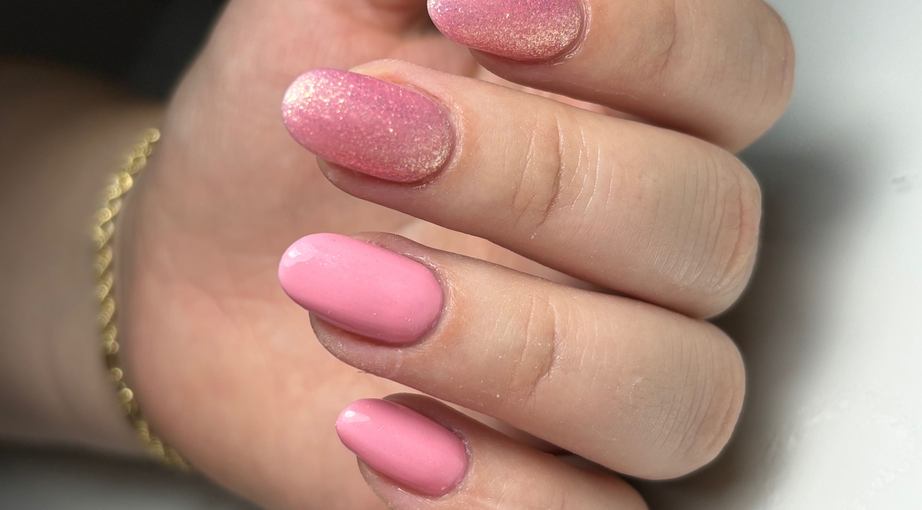 Elegant pink nail manicure at Gloss and Glow in Il-mosta, MT. Perfectly shaped nails with a shimmering finish.