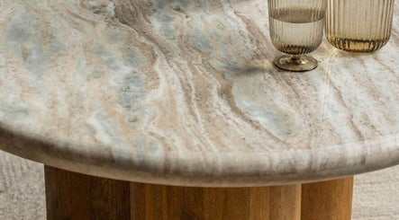 Elegant marble table at The Aesthetic House, London, England, GB adds a luxurious touch to the decor.