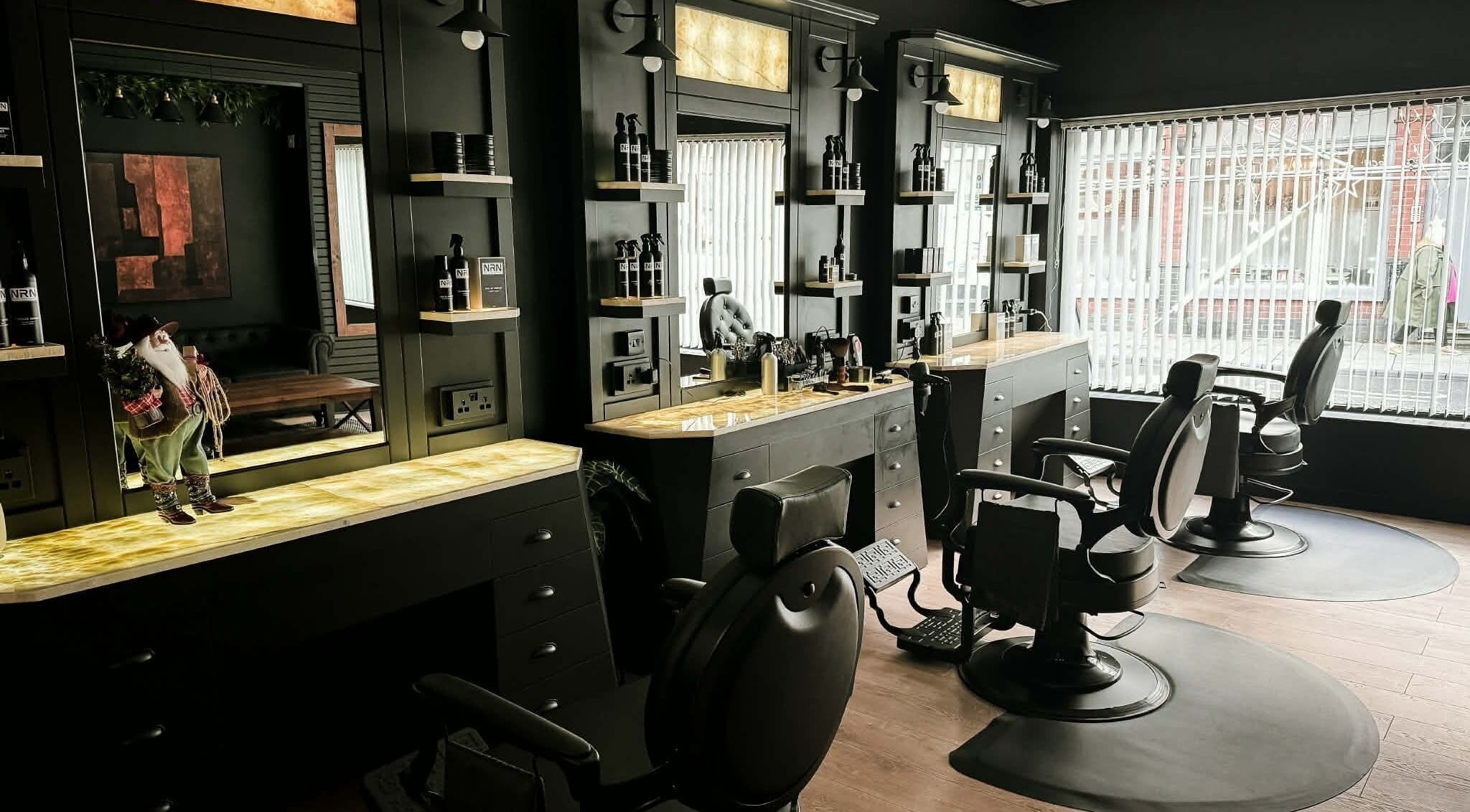 Modern barber chairs and styling stations at NRN Whitchurch, Whitchurch, England, GB offering premium grooming.