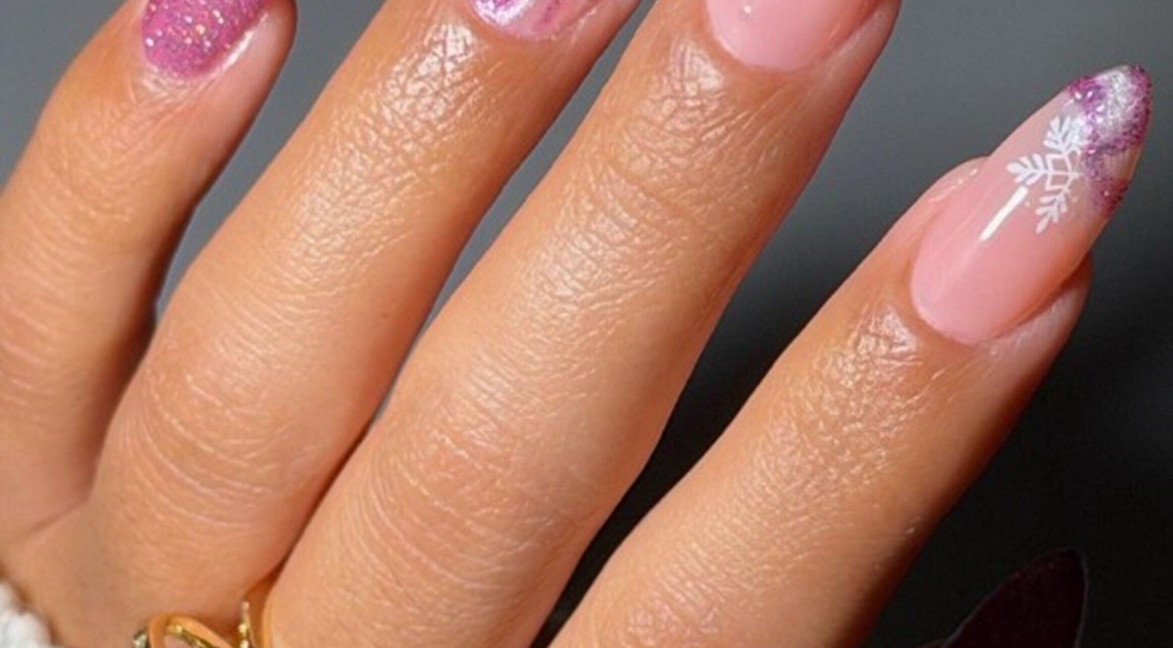 Elegant nail art with snowflake and glitter at BeautyBar@Hills, Rouse Hill, New South Wales, AU.