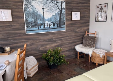 Relaxing treatment room at Pemf Healing Waves, Coquitlam, British Columbia, CA, featuring serene decor.