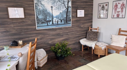Relaxing treatment room at Pemf Healing Waves, Coquitlam, British Columbia, CA, featuring serene decor.