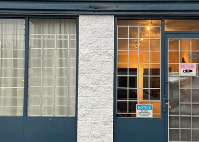 Front entrance of Pemf Healing Waves at Coquitlam, British Columbia, CA, showcasing modern design.