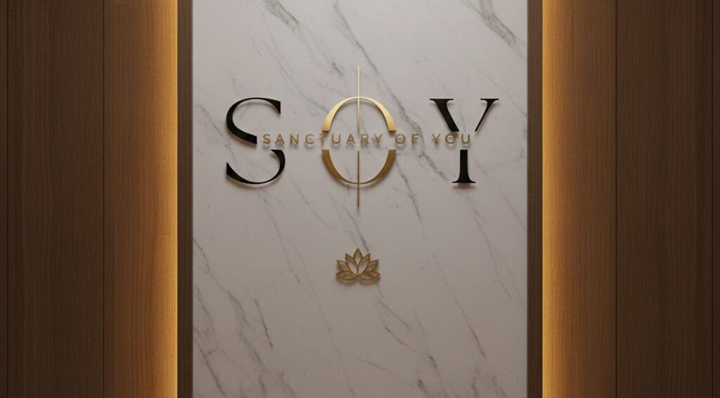 Entrance sign for Sanctuary Of You in San Juan, San Juan, PR featuring gold accents on a marble background.