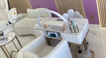 Elegant manicure station at Urban Beauty, Tijuana, Baja California, MX, featuring plush seating and modern decor.