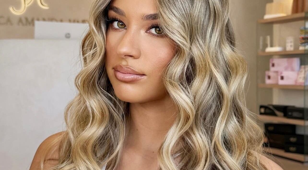 Woman with wavy blonde hair styled elegantly at By Brooke Lee, Perth, Western Australia, AU.