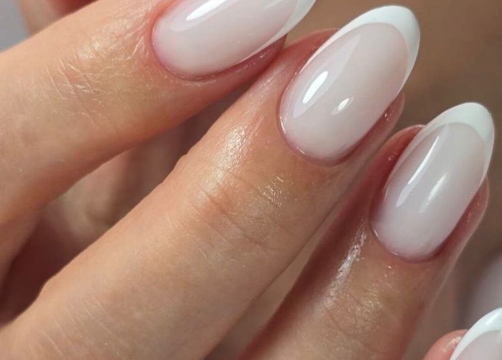 Stylish French manicure at Bougie Maison, Dublin 15, County Dublin, IE, showcasing glossy white-tipped nails.