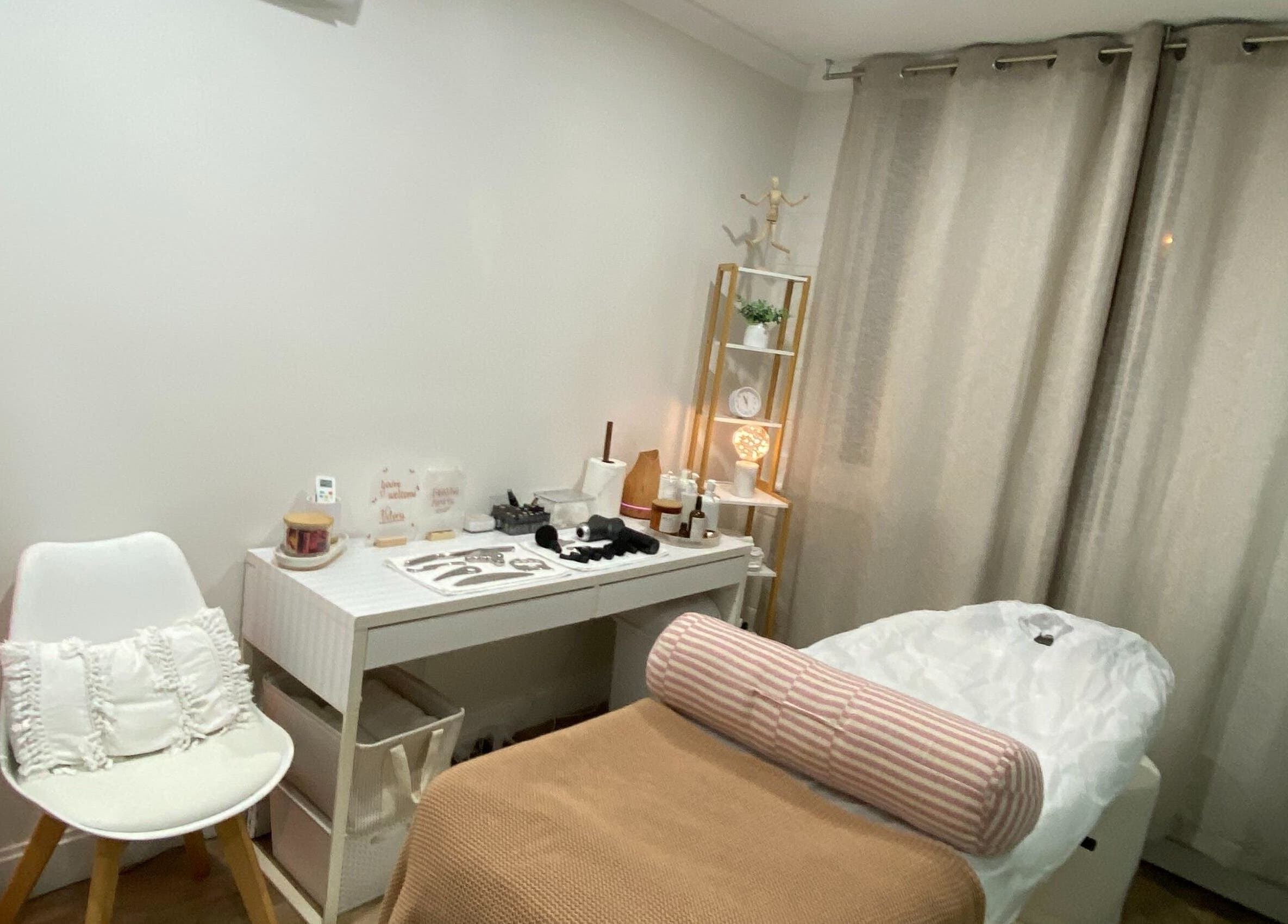 Relaxing spa treatment room at Anavi - Health and Care in Surfers Paradise, Queensland, AU with massage table and decor.