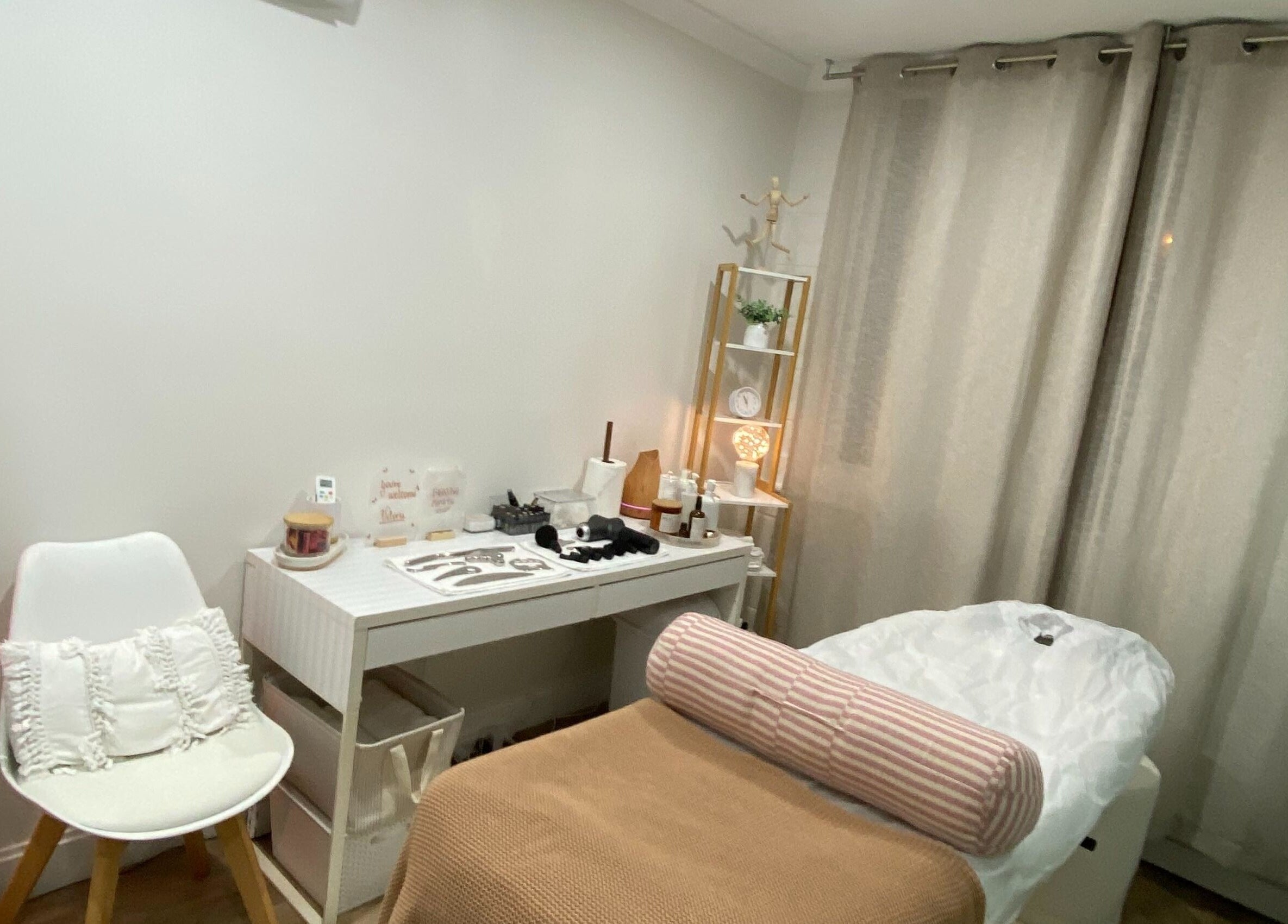 Relaxing spa treatment room at Anavi - Health and Care in Surfers Paradise, Queensland, AU with massage table and decor.