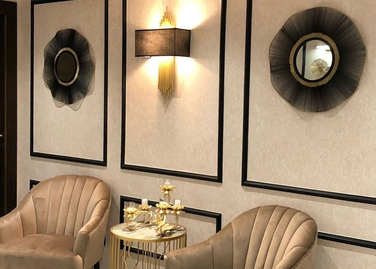 Refined seating area at Malda Salon - ملدا صالون, Jeddah, Makkah Province, SA with plush chairs and modern decor.