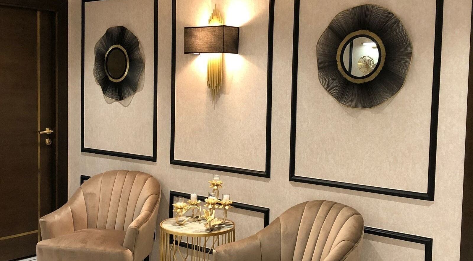 Refined seating area at Malda Salon - ملدا صالون, Jeddah, Makkah Province, SA with plush chairs and modern decor.