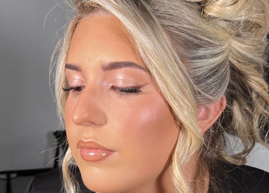 Flawless bridal look by Makeup By Naomi Jane in Ystrad Mynach, Wales, GB featuring soft waves and glowing skin.