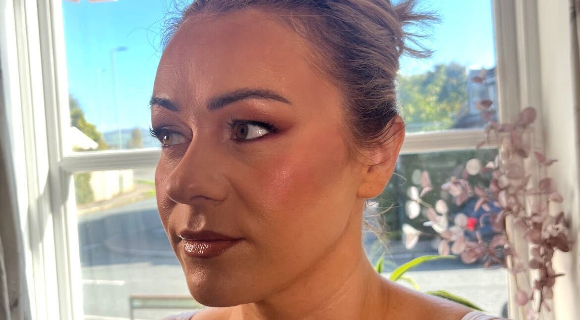Close-up of radiant makeup by Makeup By Naomi Jane at Ystrad Mynach, Wales, GB in natural light.