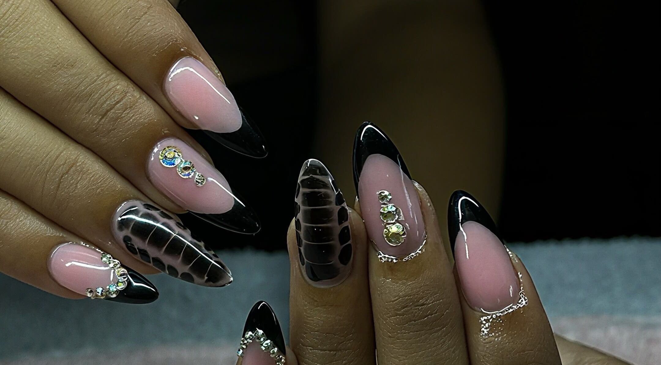 Stylish nail art with jewels at Cait & Co. in Cape Town, Western Cape, ZA.