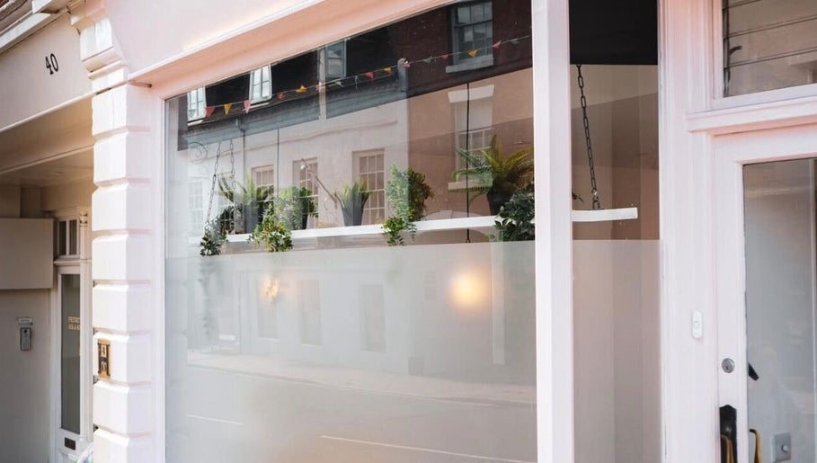 Front view of Nics Nails in Shrewsbury, England, GB showcasing elegant window decor and modern exterior.