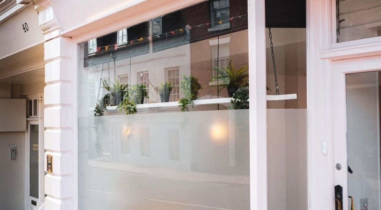 Front view of Nics Nails in Shrewsbury, England, GB showcasing elegant window decor and modern exterior.