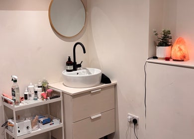 Serene beauty room at Nics Nails, Shrewsbury, England, GB with elegant sink and calming decor.