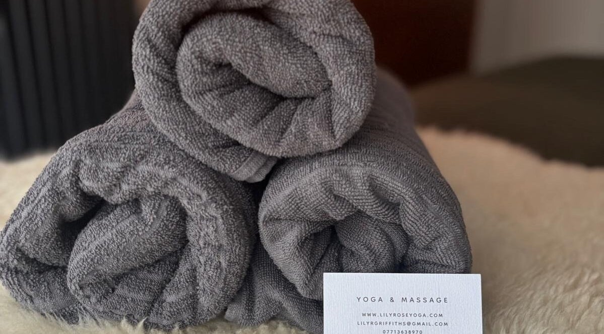 Rolled towels at Lily Rose Yoga & Massage, Edinburgh, Scotland, GB, offering relaxation and wellness.