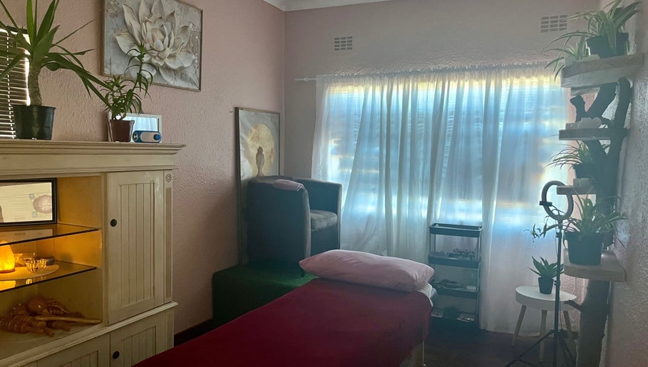 Relaxing treatment room with plants at H.E.R - Heal. Embody. Rise, Cape Town, Western Cape, ZA.