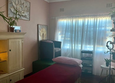 Relaxing treatment room with plants at H.E.R - Heal. Embody. Rise, Cape Town, Western Cape, ZA.