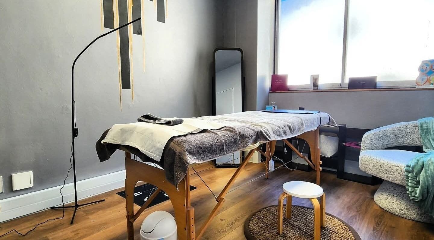 Relaxing spa room at Smu_th in the city | Dr.K, Cape Town, Western Cape, ZA. Cozy massage table and ambient decor.