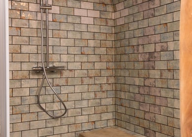 Stylish shower area at Hyperbaric Spa Albufeira, Albufeira, Faro, PT with rustic tiled walls.