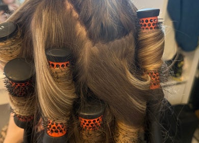 Hair styled with curling brushes at Amy Rose Hair in Newcastle-under-Lyme, England, GB.