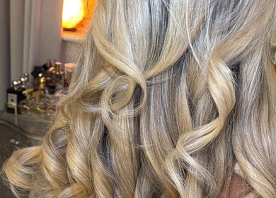 Blonde curls styled at Amy Rose Hair, Newcastle-under-Lyme, England, GB. Perfect salon finish.