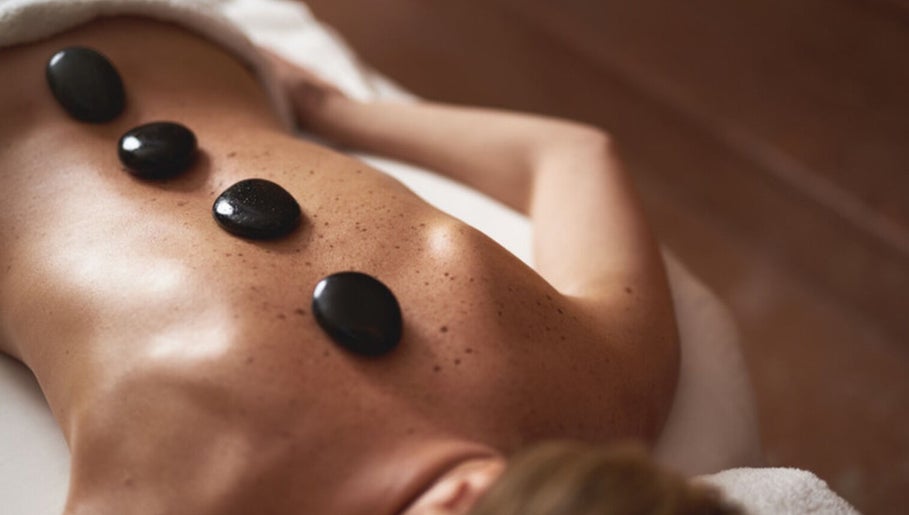 Hot stone massage at thaii in Velké Poříčí, Královéhradecký Kraj, CZ offering relaxation and wellness.