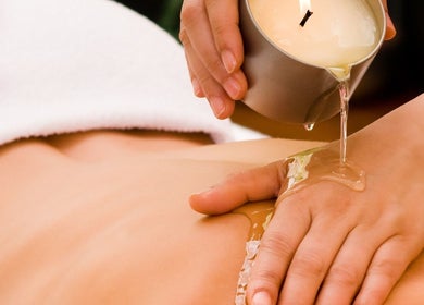 Relaxing candle oil massage at Thaii, Velké Poříčí, Královéhradecký Kraj, CZ, enhancing wellness and calm.