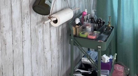 Beauty supplies on a cart at Lash Ark, Worcester Park, England, GB, offering a neat wellness space.
