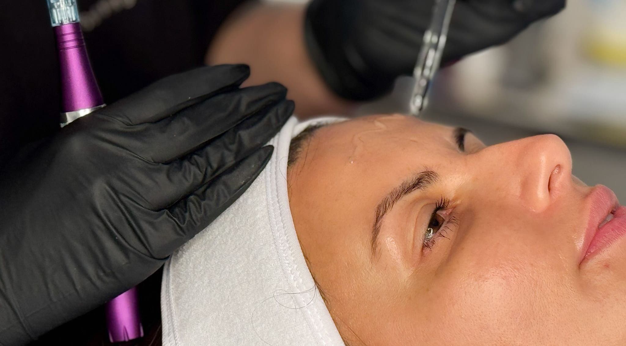 Facial treatment at Sal King Aesthetics, St. Neots, England, GB, showcasing detailed skincare process.