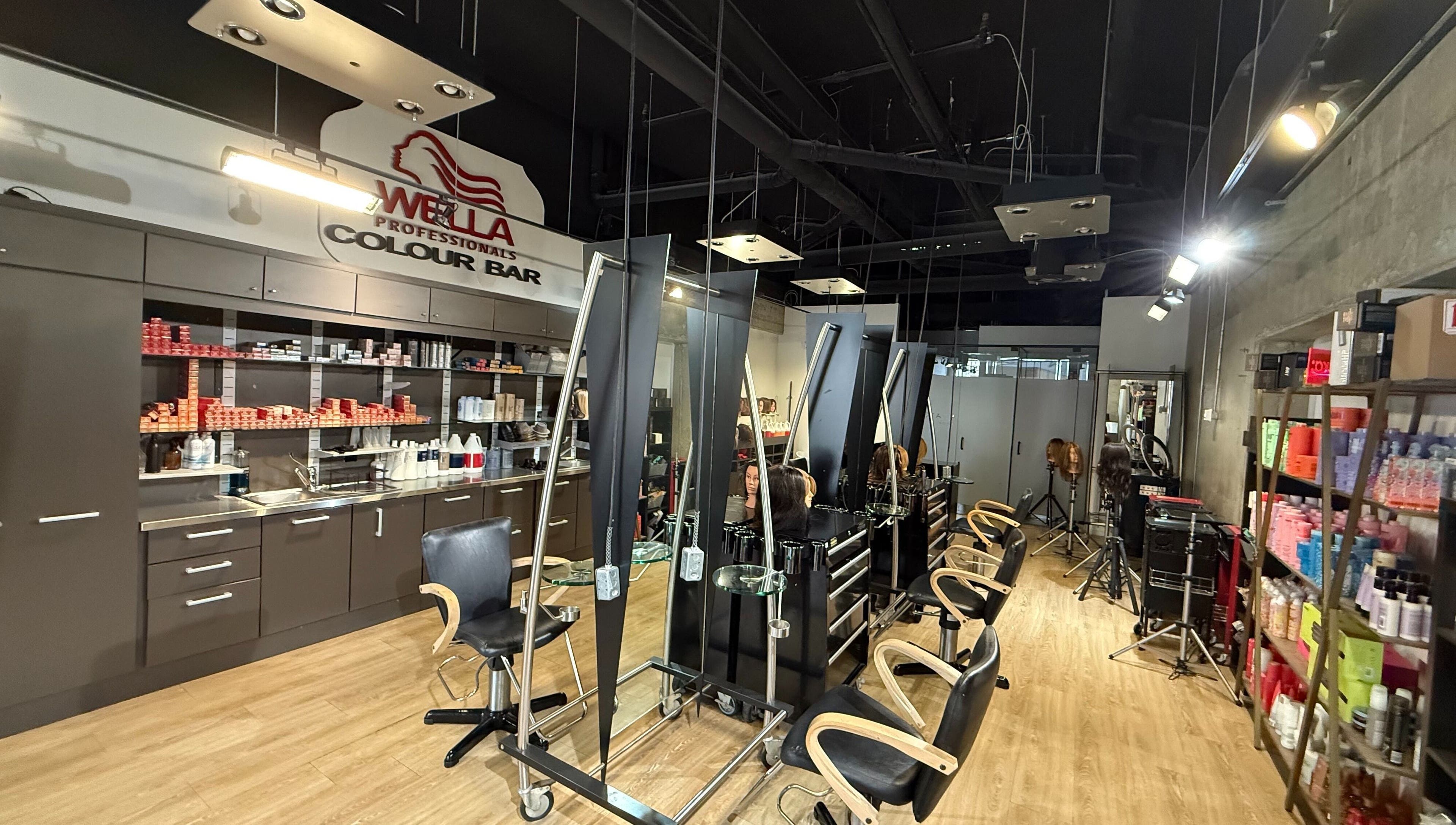 Modern salon interior at HairXtacy Academy Graduates, Burlington, Ontario, CA, featuring hairdressing stations.