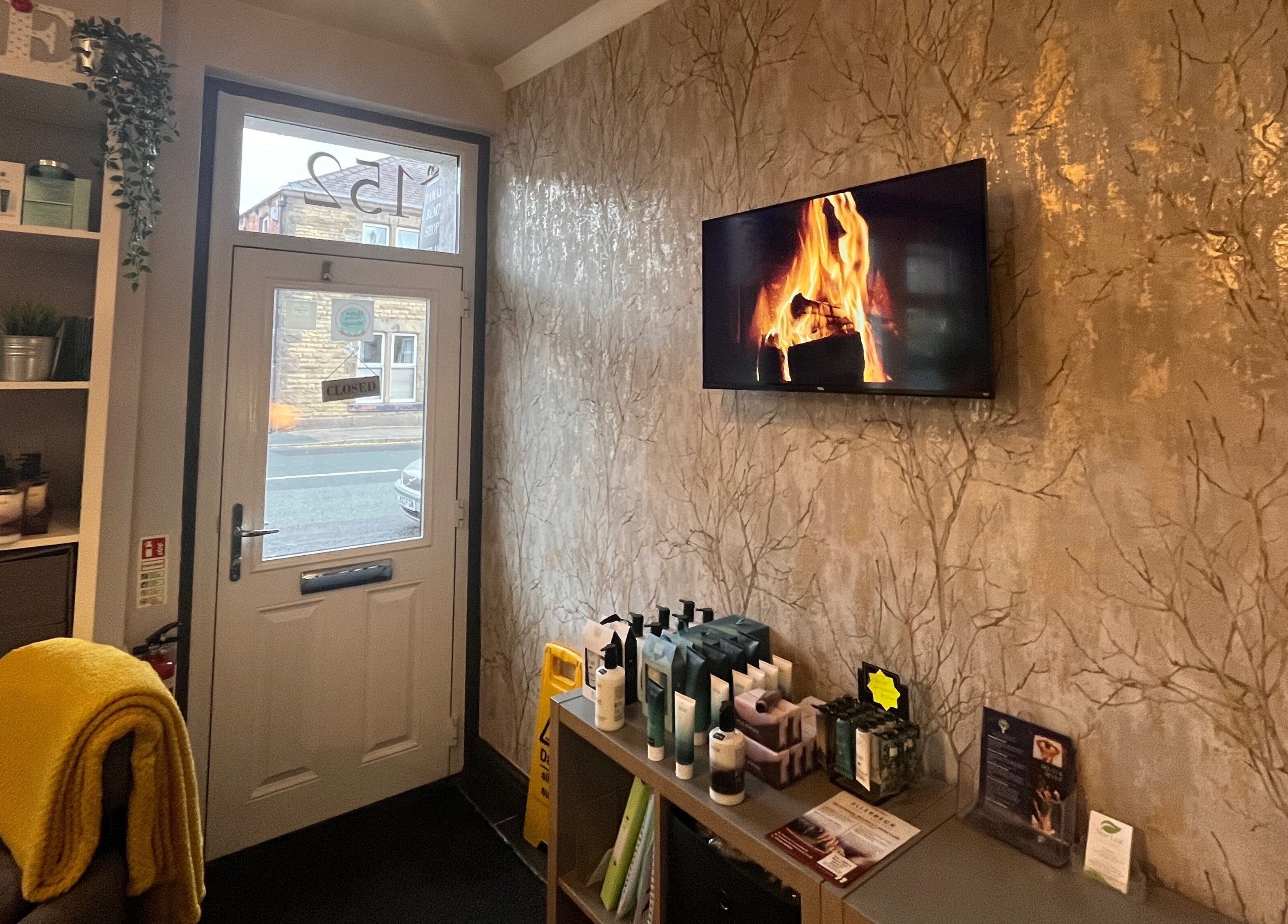 Welcoming interior of Hattie’s Healing Massage For Ladies, Adlington, England, featuring a warm ambiance.