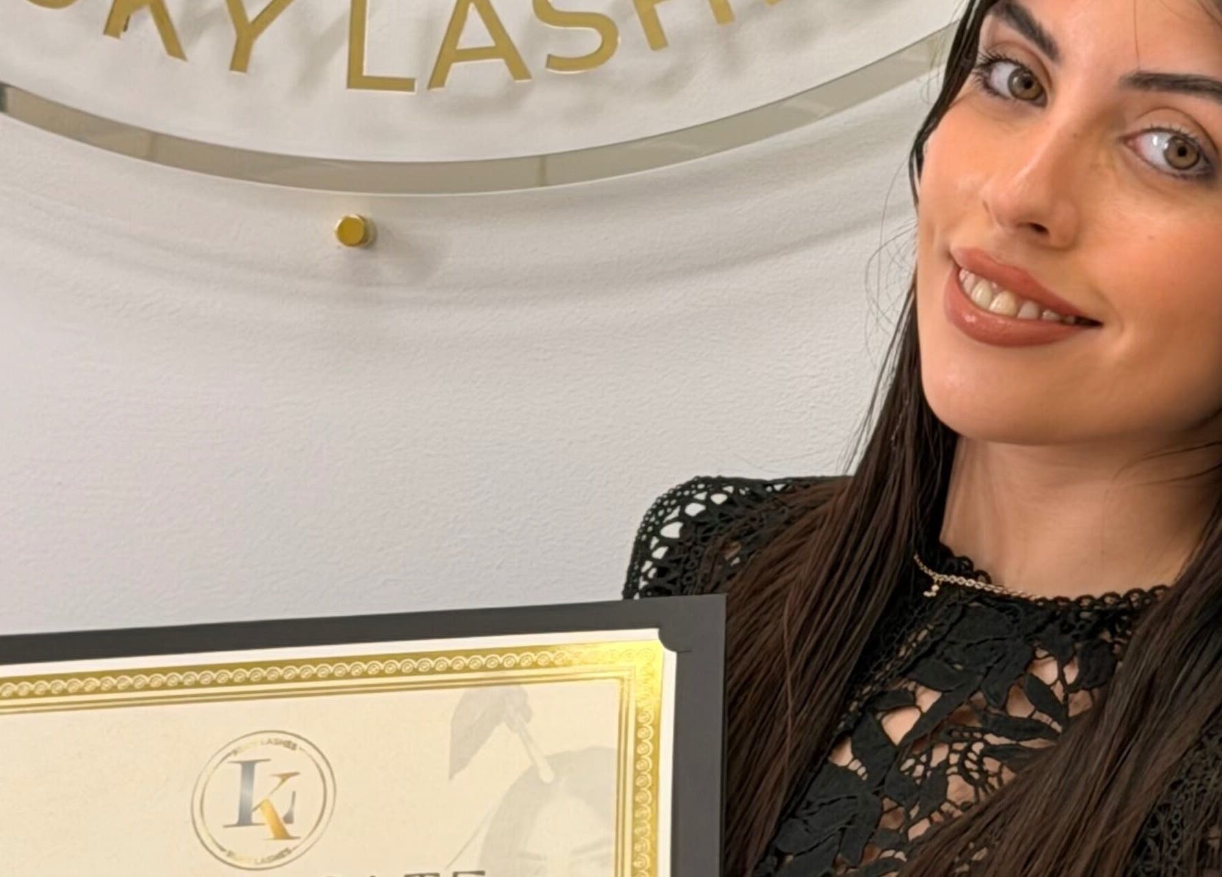 Professional at Yisel Luxe Lashes showcasing a certificate in Cutler Bay, Florida, US.