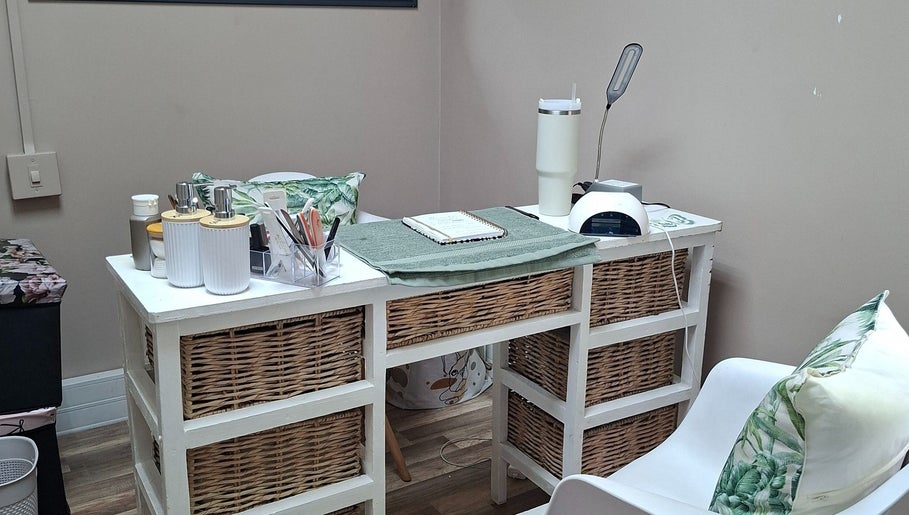 Elegant nail salon desk at Enchanted Nails by Tania in Pretoria, Gauteng, ZA offering a serene setup.