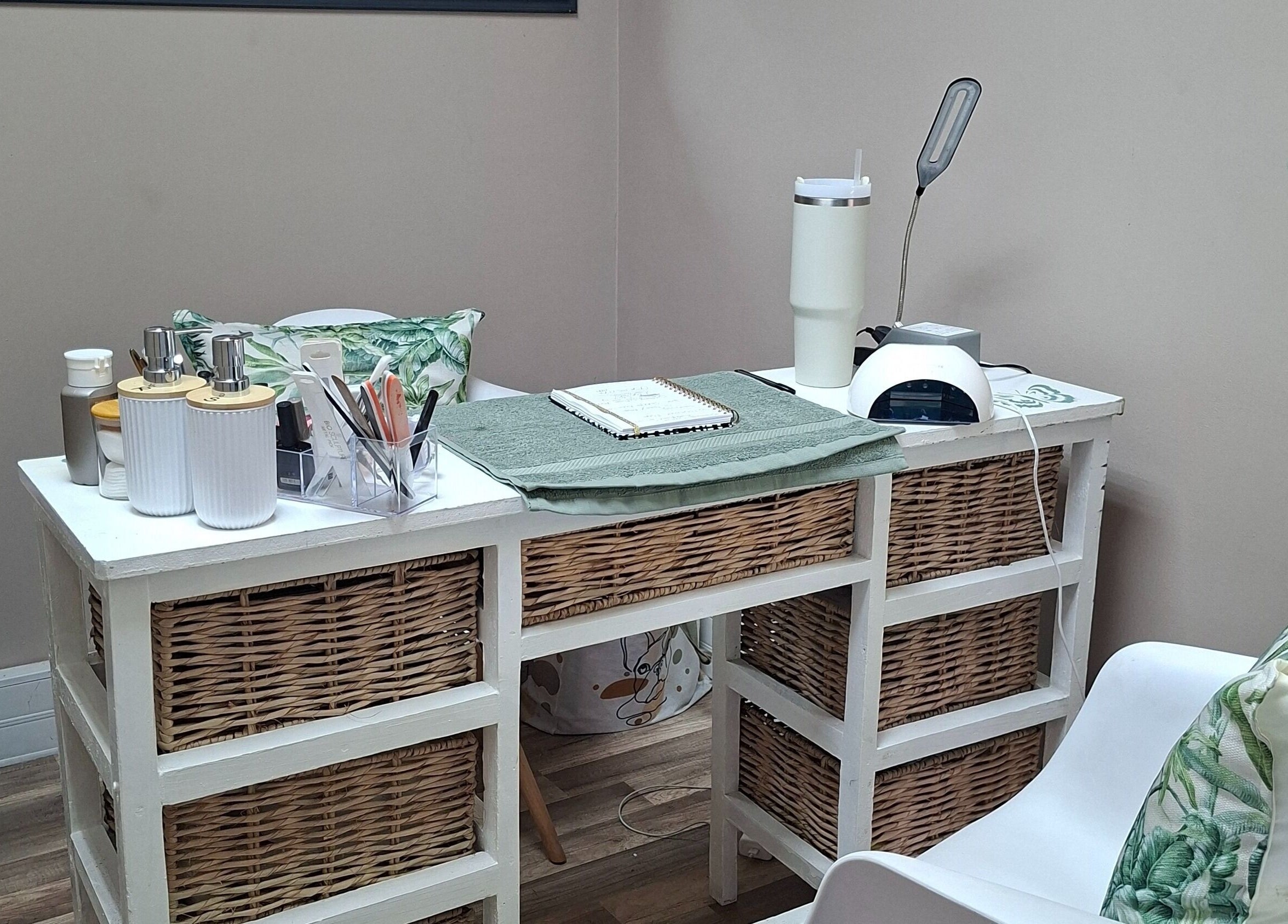 Elegant nail salon desk at Enchanted Nails by Tania in Pretoria, Gauteng, ZA offering a serene setup.