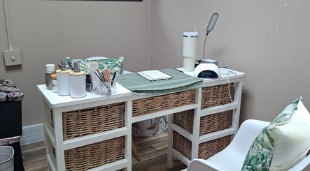 Elegant nail salon desk at Enchanted Nails by Tania in Pretoria, Gauteng, ZA offering a serene setup.