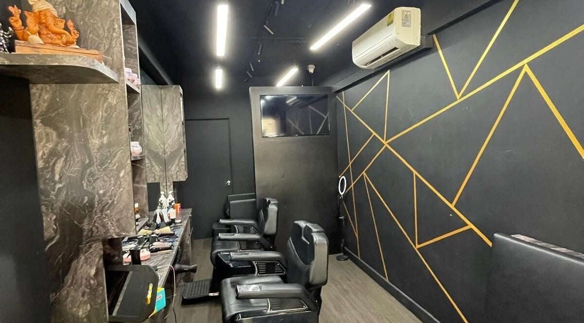 Stylish interior of Henry Gentlemen's Barber featuring sleek chairs and geometric decor in Singapore, Singapore, SG.