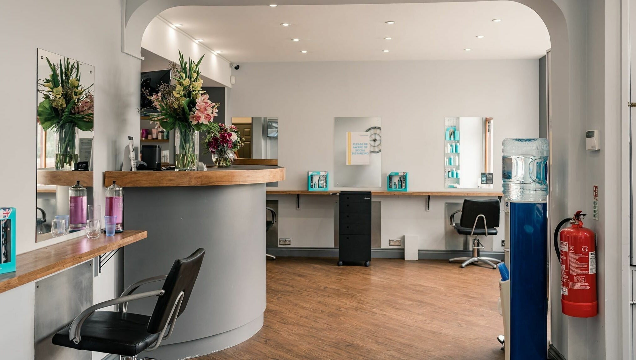 Pelo Bonito reception area with stylish decor and seating in Fladbury, England, GB.